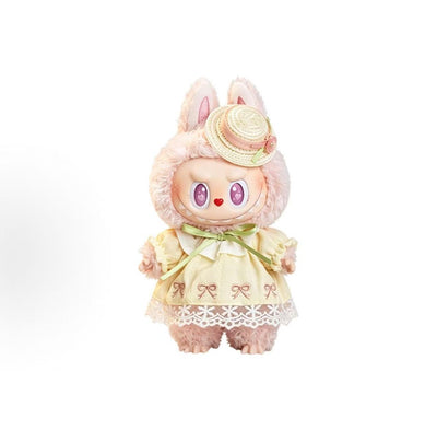 Front view of POP MART MOKOKO pink plush pendant in a yellow lace-trim dress, green ribbon and straw-style hat